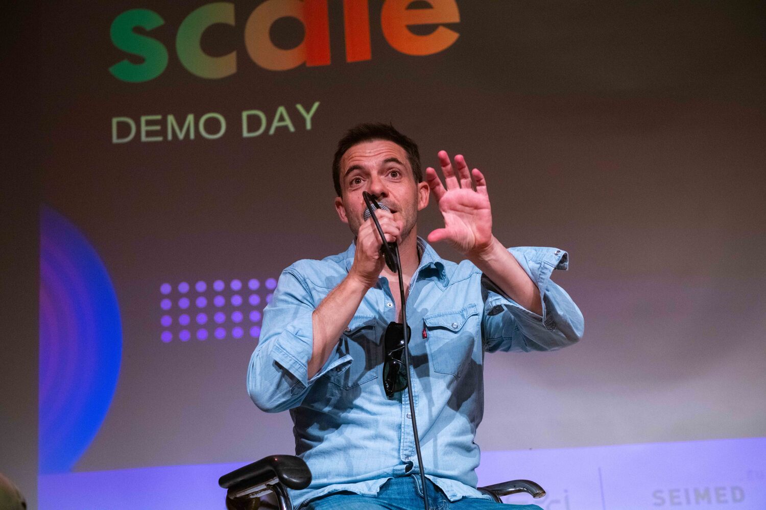 Javi Santana speaking on stage